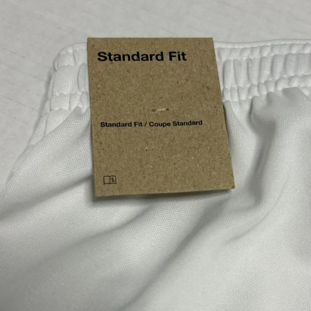 Nike White Athletic Shorts with Black Swoosh